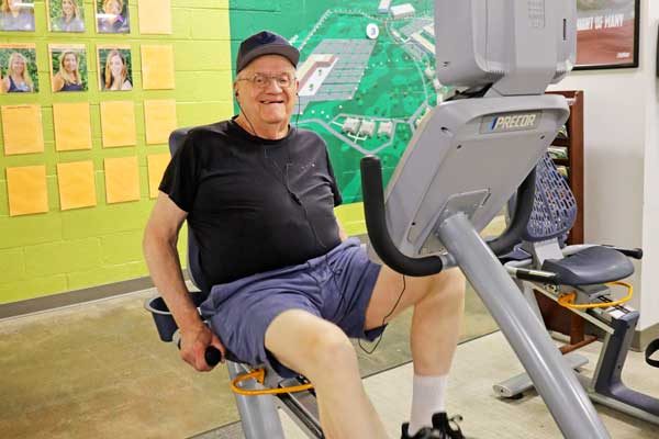 man using cardio machine at Ellis Athletic Center